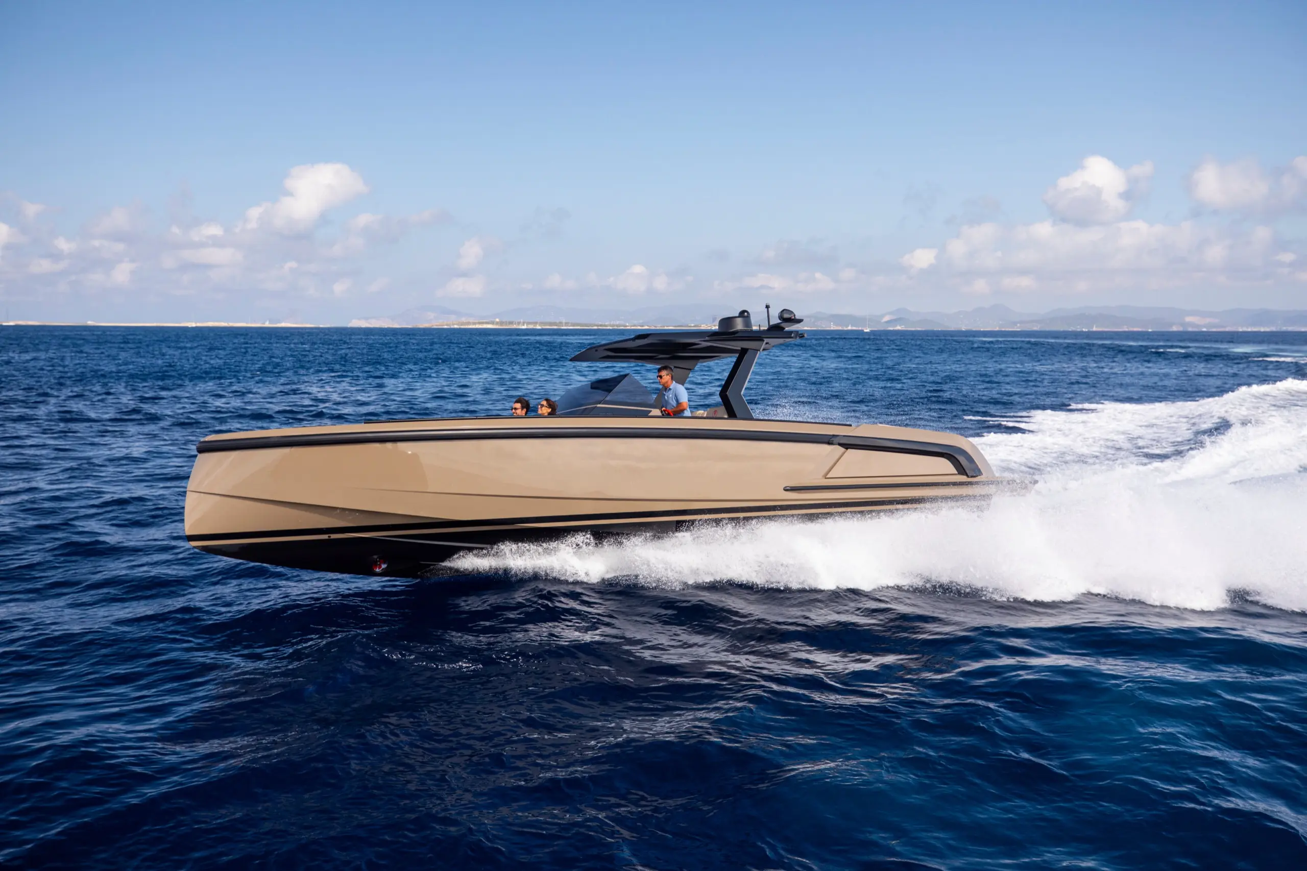 Vanquish VQ40 luxury yacht cruising at speed in Sardinia